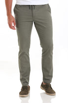 Olive green slim-fit chino pants with a drawstring waistband