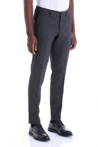 Dark gray textured wool trousers with a slim fit and subtle herringbone pattern.