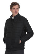 Black quilted puffer jacket with a high collar and front zipper.