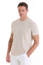 Beige short-sleeved crew neck t-shirt.