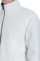 White fleece zip-up jacket with a black zipper and ribbed collar.