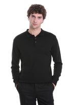 Black long-sleeved polo shirt with a classic collar and buttoned placket.