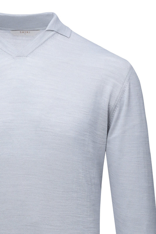 A light gray, long-sleeved polo shirt with a subtle textured weave and a clean collar.