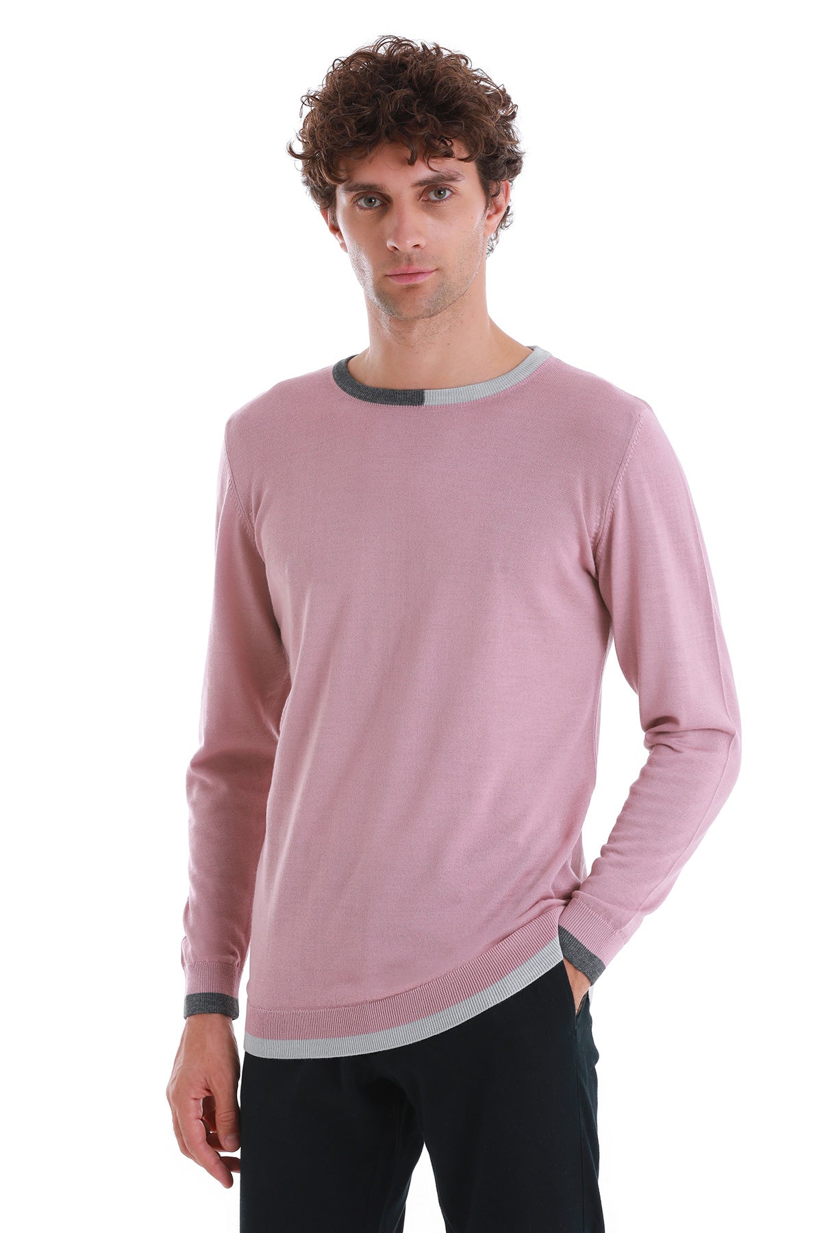 A soft pink long-sleeved sweater with a contrasting gray ribbed trim at the neckline and cuffs.
