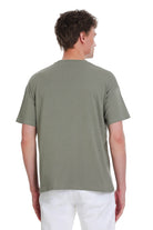 Olive green short-sleeved cotton t-shirt with a simple crew neck in a sage green oversize style
