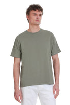 Sage green oversize cotton crew neck t-shirt with subtle embroidered logo on left chest in olive green shade