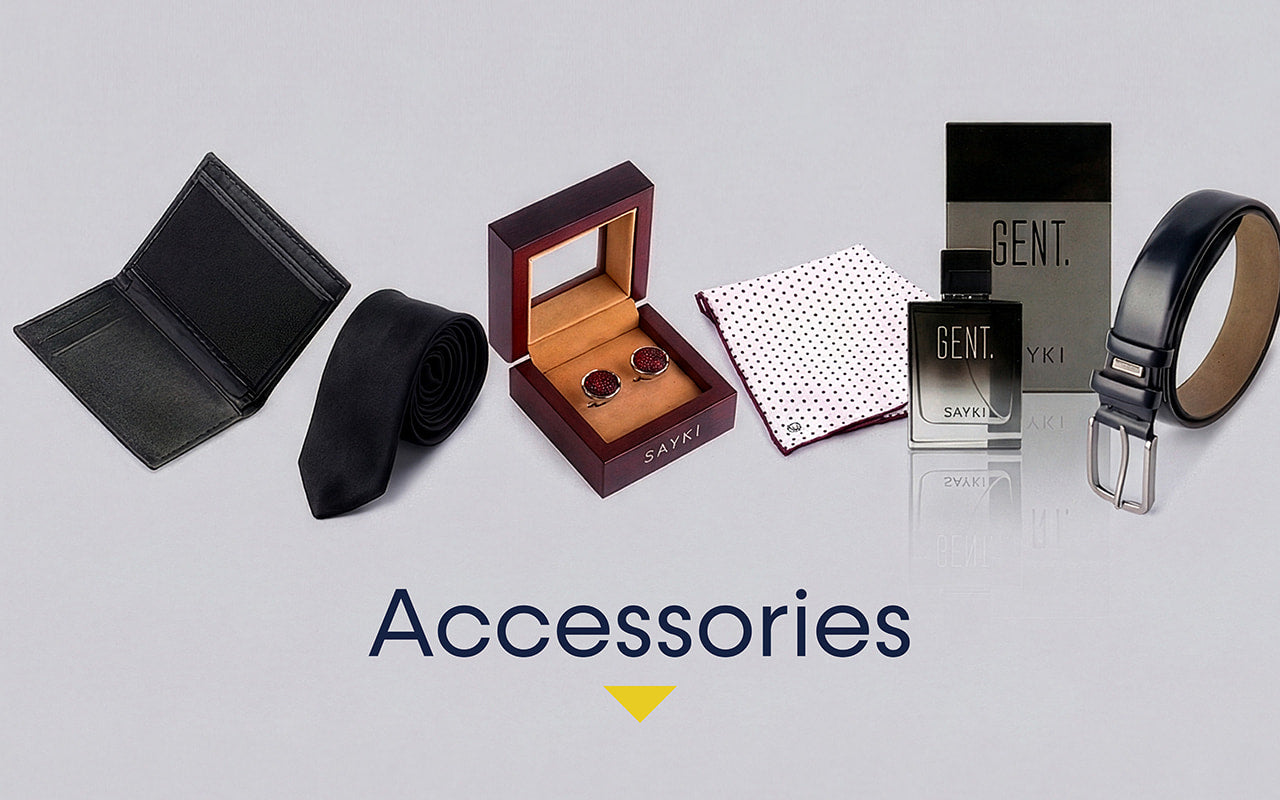 Collection of men's accessories including a wallet, tie, cufflinks, and belt on a light gray background.