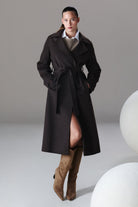 Black belted trench coat with high collar and front slit featured in sayki woman dynamic fit cachet brown oversized coat
