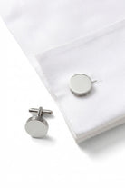 Silver toned natural stone round cufflinks with polished metallic finish and subtle concentric ring detailing