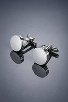 Silver toned natural stone round cufflinks with polished piston shape and two horizontal grooves on each face