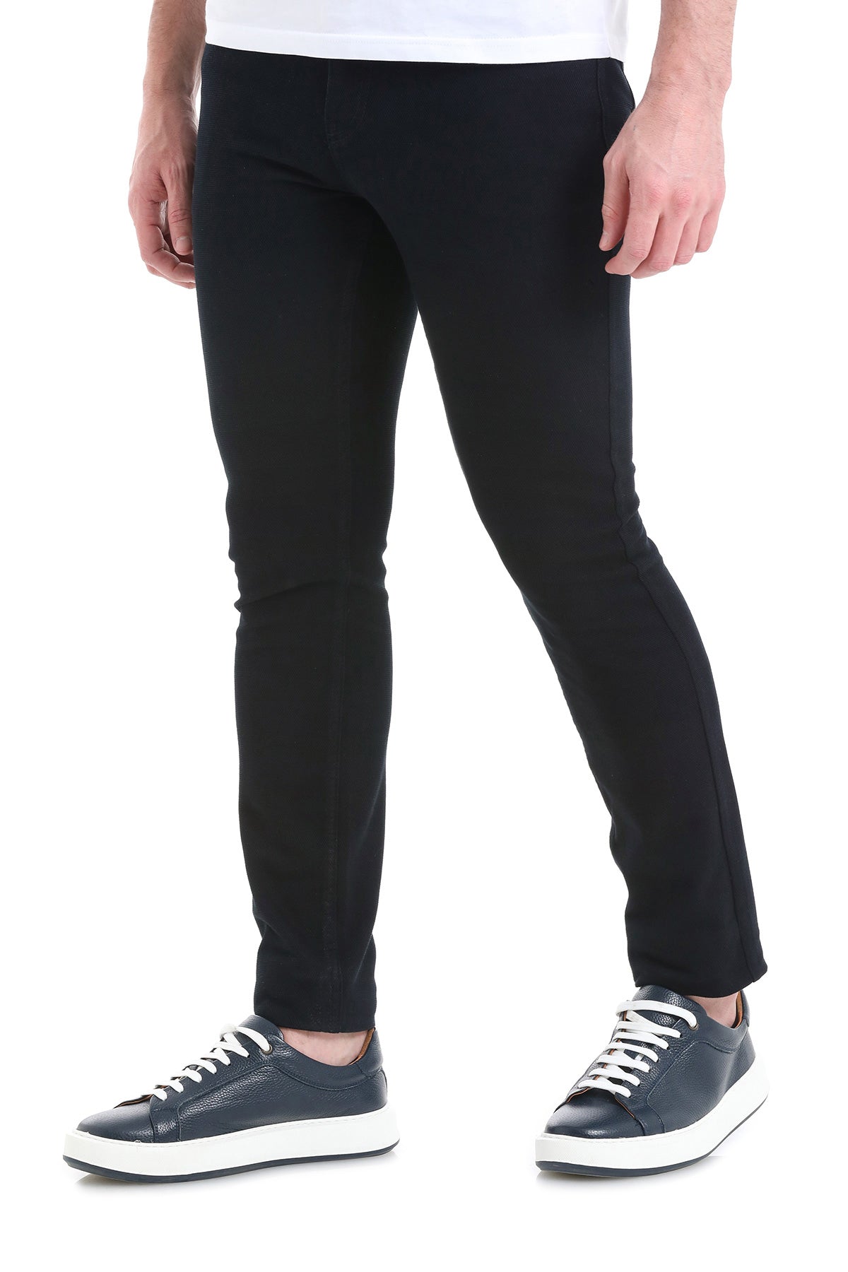 Black slim-fit trousers with a smooth, form-fitting fabric and clean stitching.