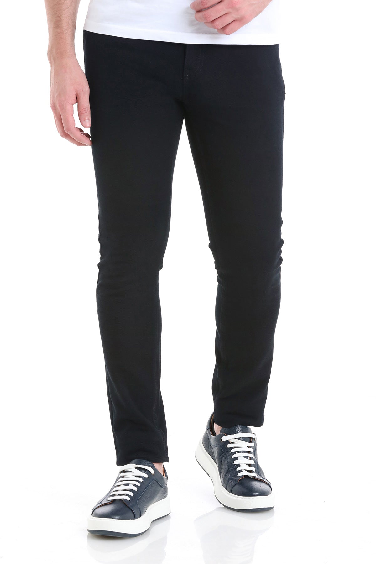 Black slim-fit trousers made of smooth, stretchy fabric with a clean, modern design.