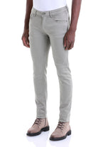 Beige slim-fit denim jeans with a classic five-pocket design and subtle stitching details.