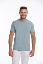A light blue, short-sleeved crew neck t-shirt made of soft cotton fabric.