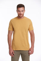 A men’s mustard-yellow crew-neck cotton t-shirt.