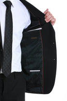 Slim fit black peak lapel tailored blazer with subtle red stitching and satin-lined interior by kate middleton
