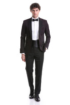 Black tuxedo suit with satin lapels and matching trousers.