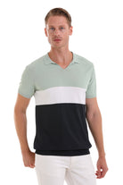 A men’s short-sleeved polo shirt with a light mint green upper section, a white horizontal stripe across the midsection, and a solid black lower portion.