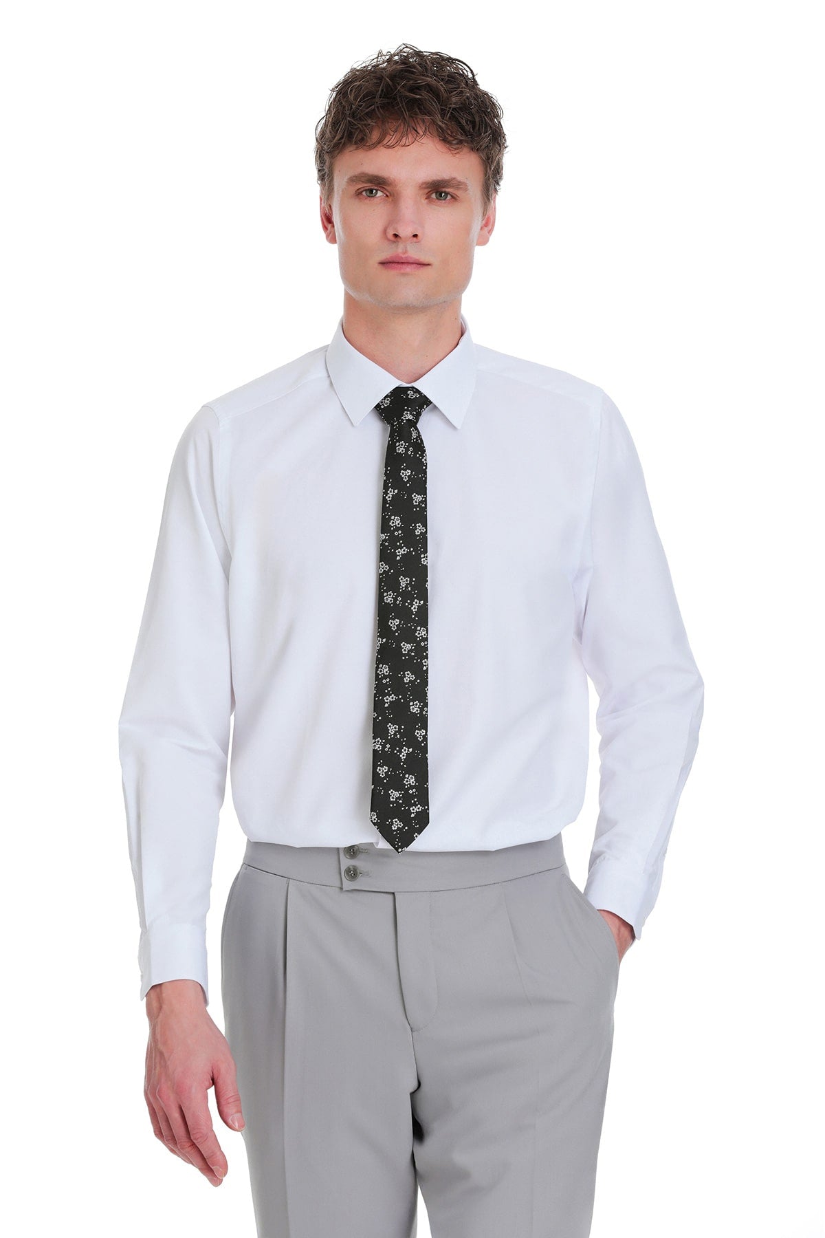 Black tie with a subtle white floral pattern.