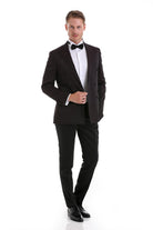 Black tuxedo jacket with notched lapels and double-breasted front, paired with matching trousers.