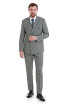 A tailored gray double-breasted suit with a structured fit and subtle texture.
