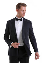 Slim fit black double-breasted tuxedo jacket with notched lapels and satin trim for classic formal wear