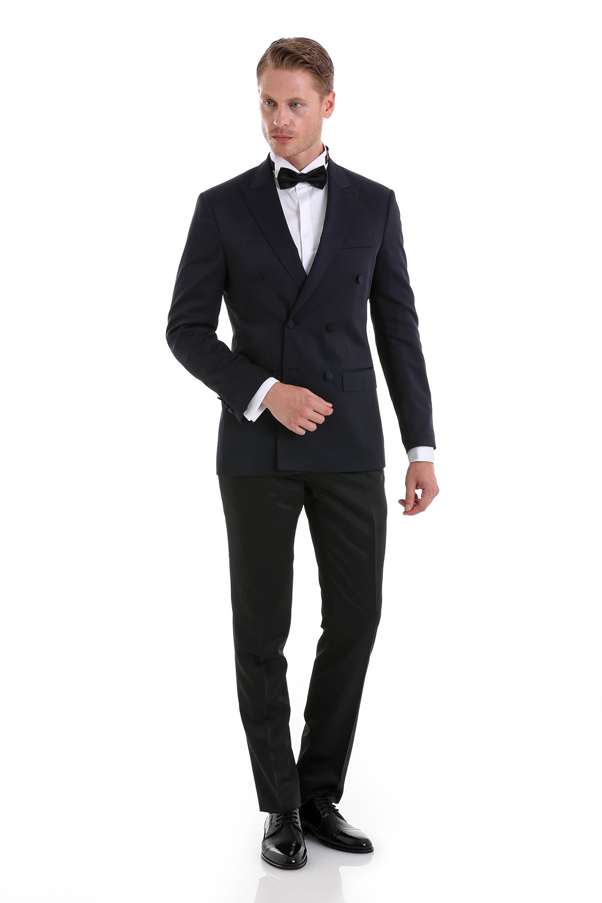 Black slim fit double breasted tuxedo suit with satin lapels and matching trousers for formal occasions