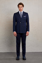 Navy blue double-breasted suit with a subtle texture and matching trousers