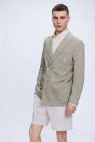 Slim fit double breasted olive linen blazer with light green textured weave and cream-colored buttons for casual wear
