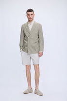 Slim fit double breasted olive linen casual blazer in light green with subtle texture and matching buttons