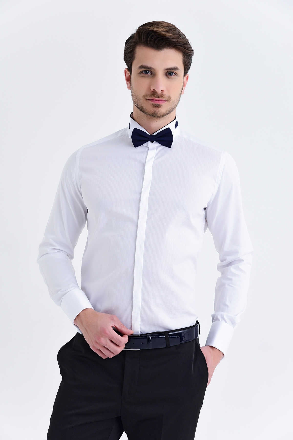 White men’s formal long-sleeve dress shirt with a crisp collar and button-down front.