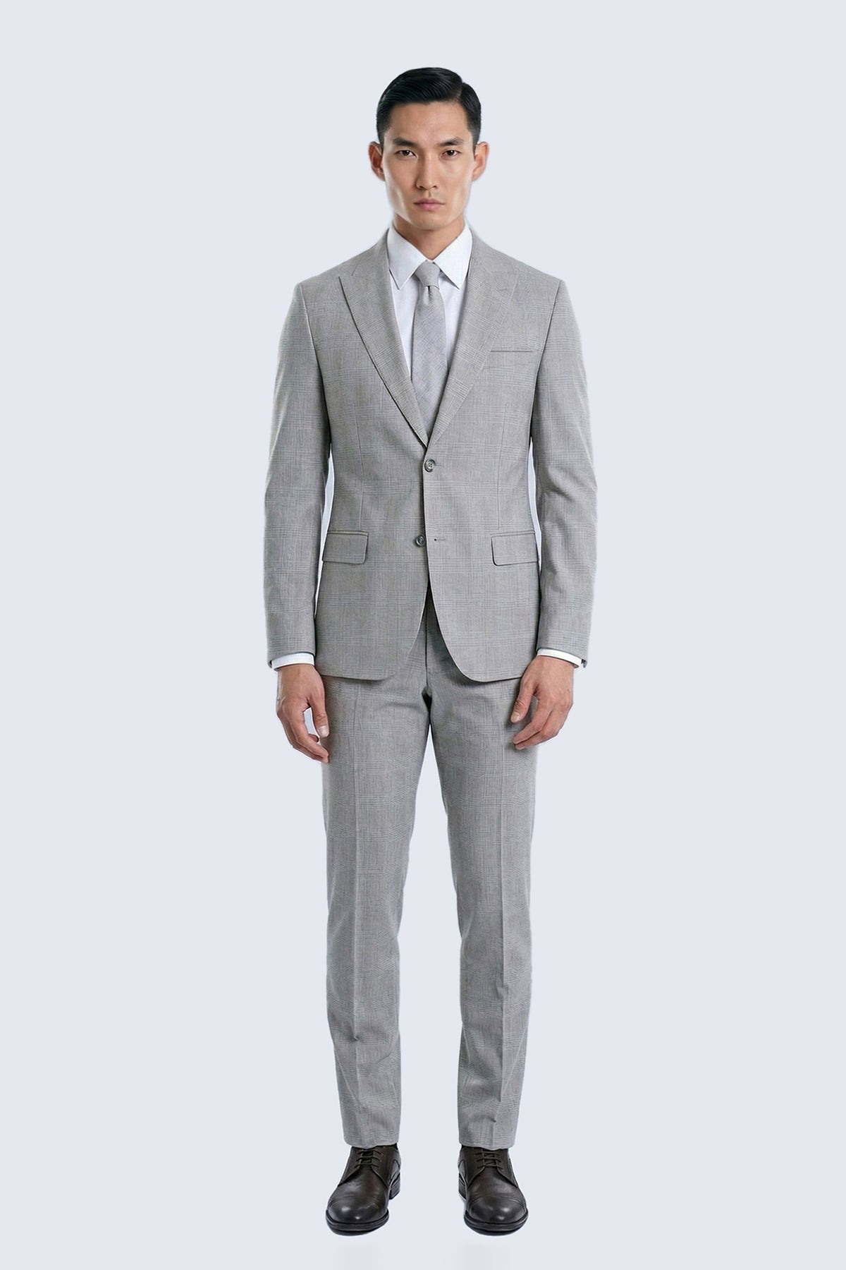 Slim fit gray wool blend classic suit with subtle plaid pattern featuring a two-button peak lapel jacket and trousers