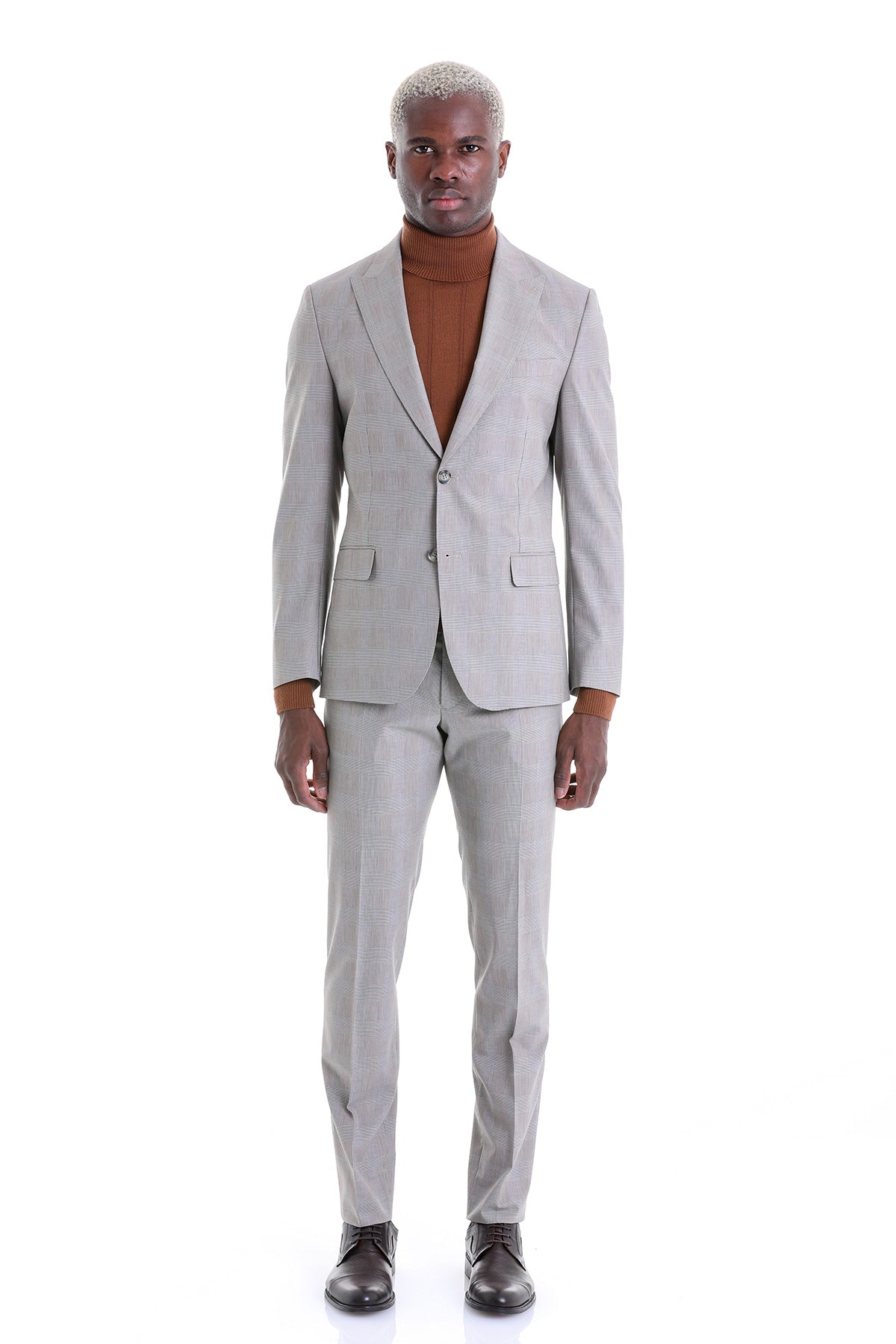 A tailored light gray suit with a subtle check pattern, featuring a single-breasted jacket and matching trousers.