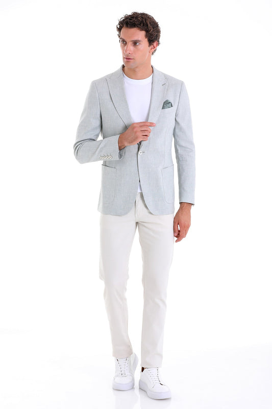 Light gray tailored blazer with a subtle texture and matching pocket square.
