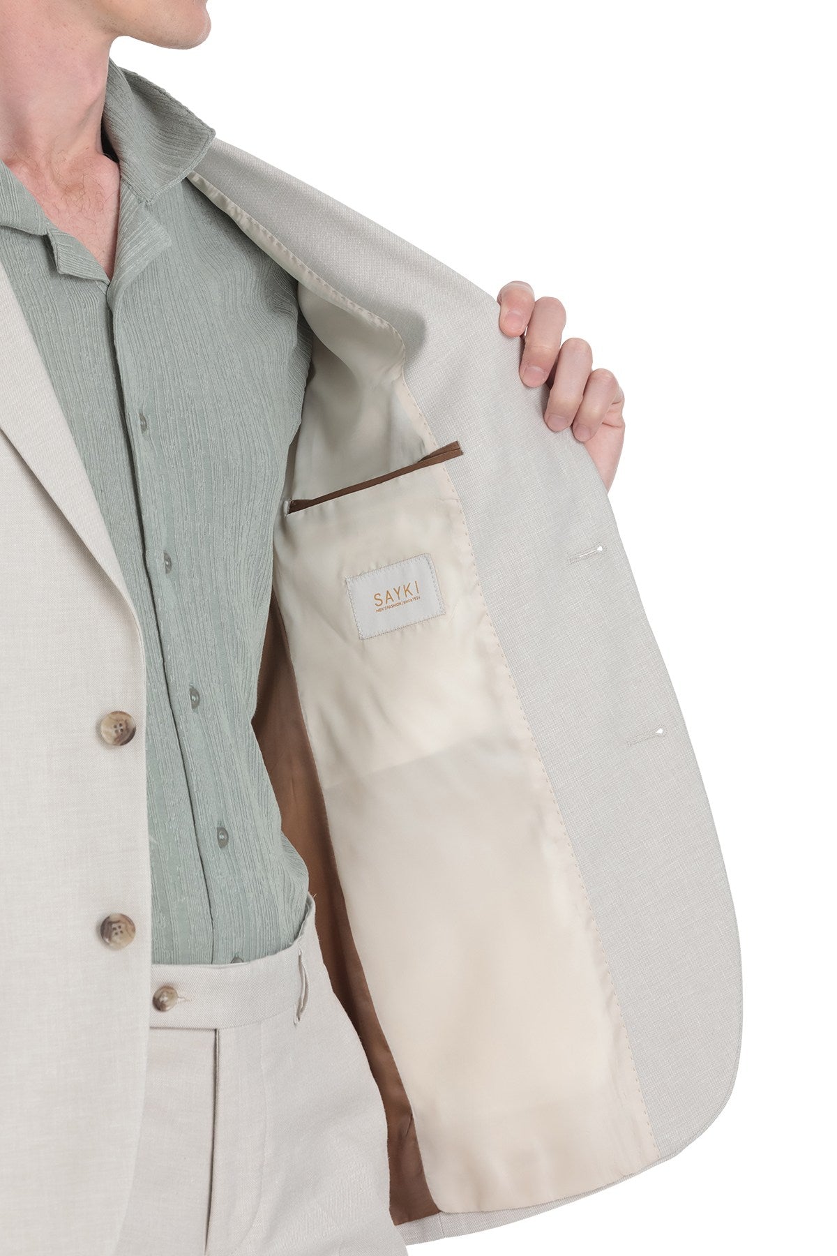Beige sakki men’s blazer with a subtle textured fabric and matching inner lining.