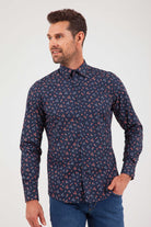 A navy blue long-sleeved button-up shirt with a subtle pattern of small pink and light blue floral motifs.