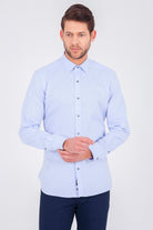Light blue, long-sleeved men’s dress shirt with a classic collar and buttoned cuffs.