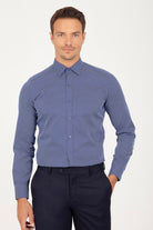 Blue patterned men’s dress shirt with a subtle geometric design.