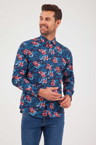 Men’s long-sleeved button-up shirt with a vibrant floral pattern in shades of red, pink, and teal on a dark navy background.