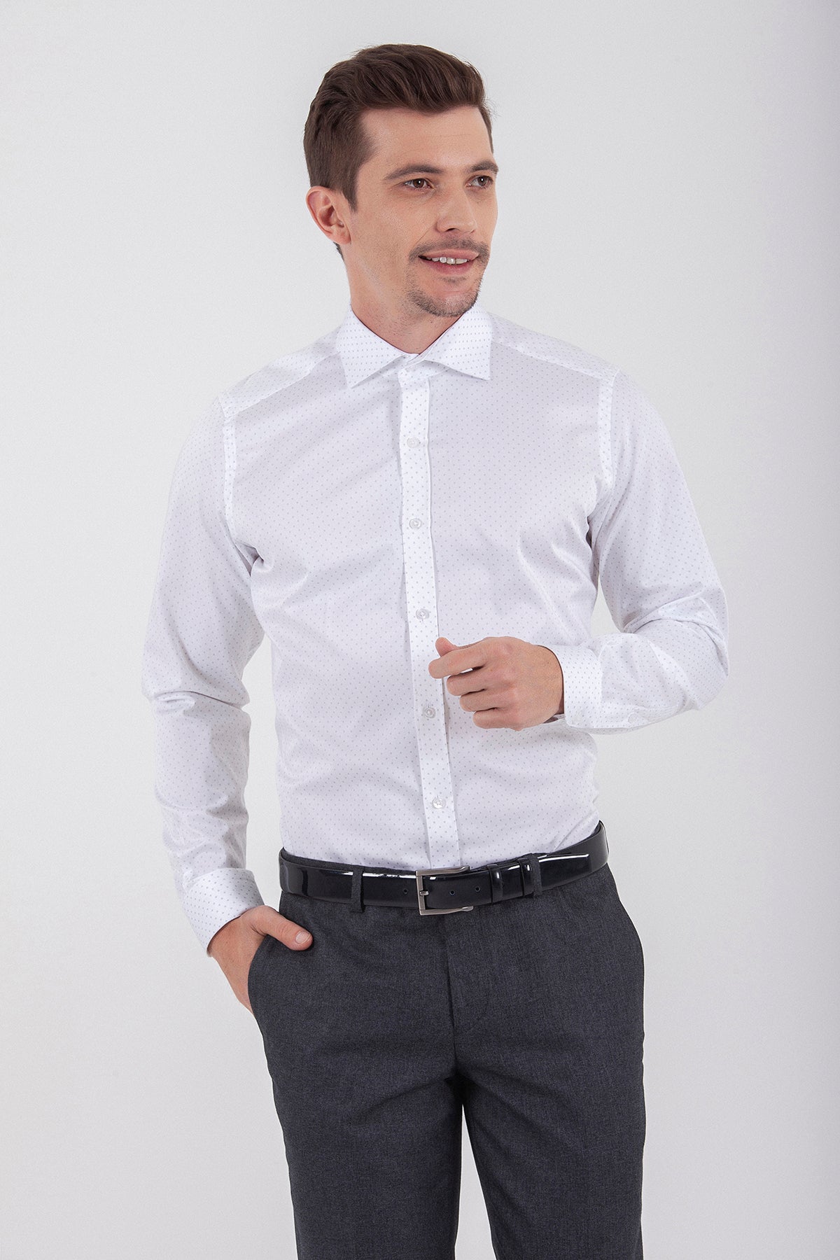 White long-sleeved dress shirt with a classic collar and button-down front.