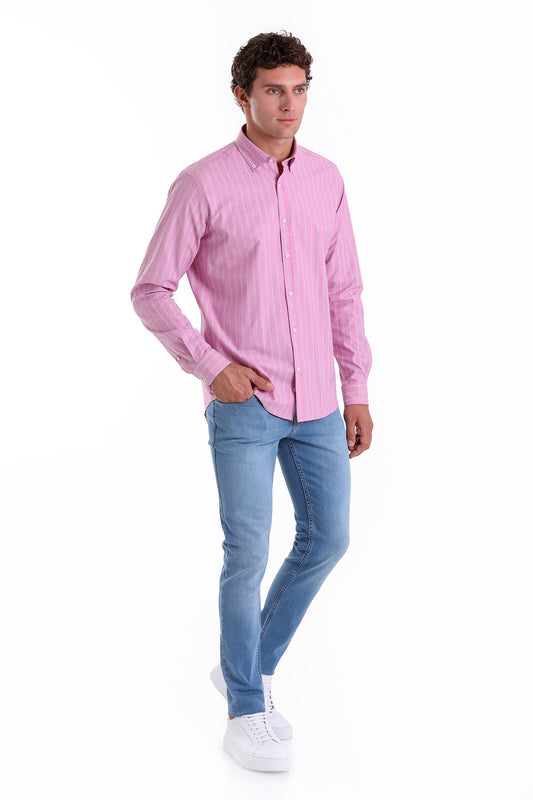 A man wearing a pink striped long-sleeved button-down shirt.