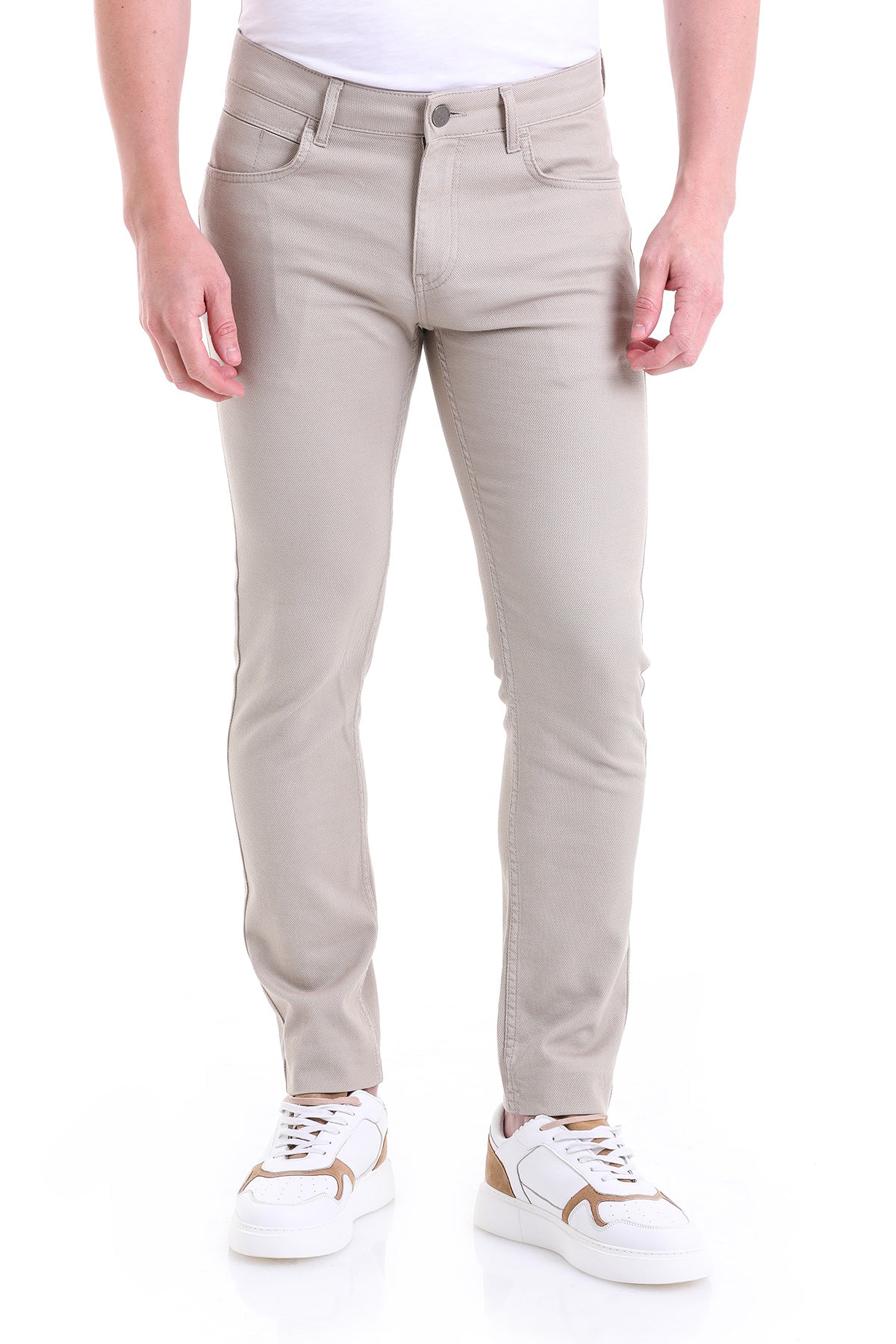 Beige slim-fit denim jeans with a classic five-pocket design and subtle stitching details.