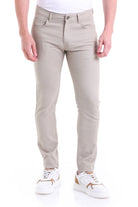Beige slim-fit denim jeans with a classic five-pocket design and subtle stitching details.