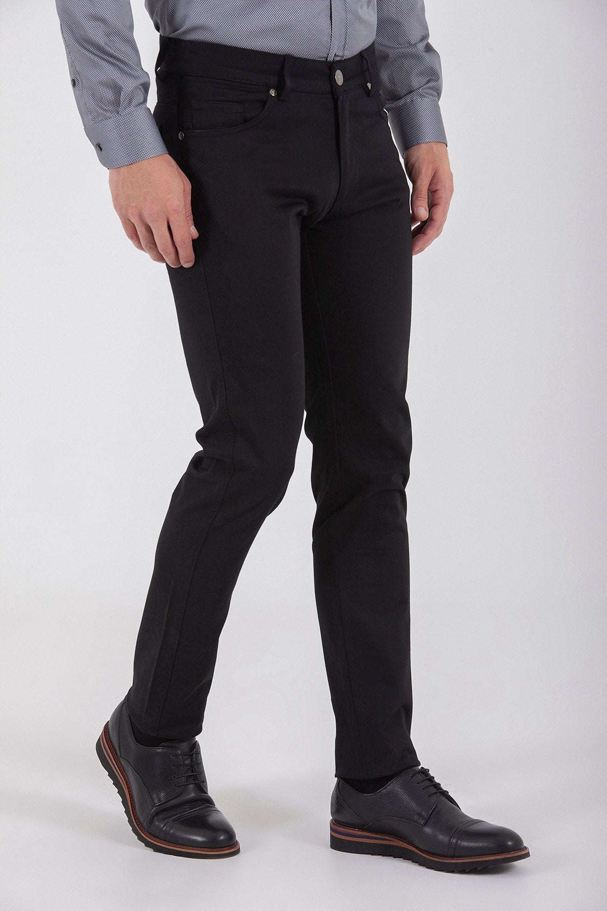 Black slim-fit denim jeans with a classic five-pocket design and silver-toned hardware.
