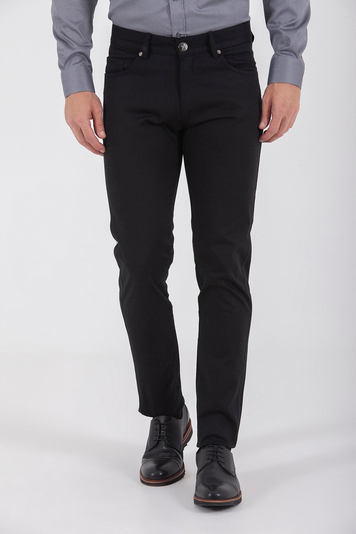 Black slim-fit trousers with a classic five-pocket design and silver-toned button.