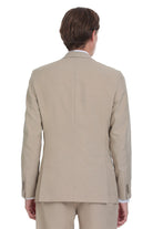 Beige tailored suit jacket with a clean, structured fit and subtle stitching details.