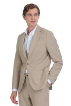 Beige two-button suit jacket with a tailored fit and subtle texture.