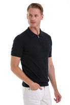 Black textured knit polo shirt with a subtle ribbed pattern and a zipper at the collar.
