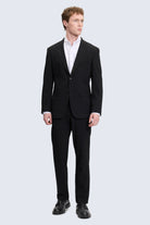 Slim fit black smart casual suit with notch lapel and sleek modern cut featuring two-button closure