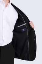 Slim fit black tailored blazer with subtle gray stitching and branded label featuring a notch lapel for smart casual wear